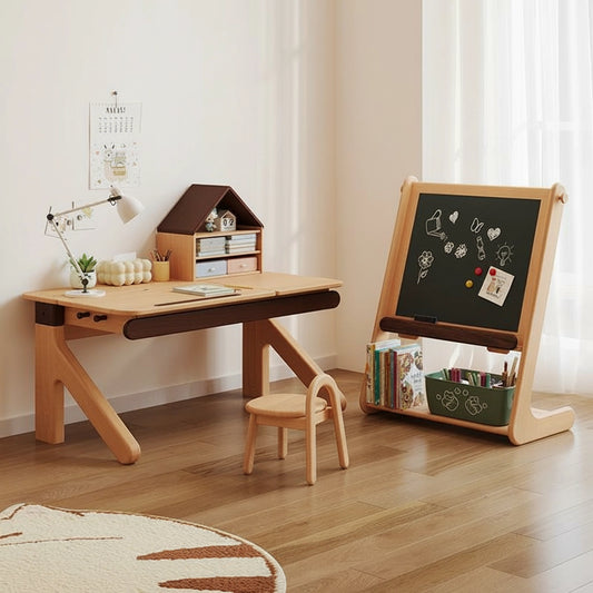 Playroom setting showing a solid beech study desk with a table lamp alongside the magnetic chalkboard easel
