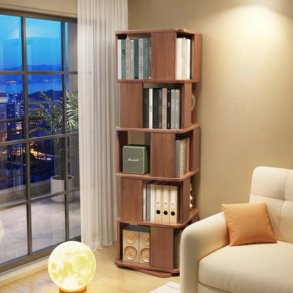 Tall five-tier solid rubberwood rotating bookshelf filled with books next to a cream couch
