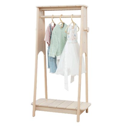 Light wood adjustable kids clothing rack with hanging clothes on a white background