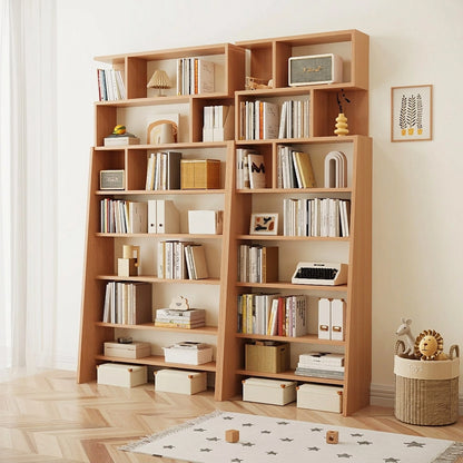 Angled view of two pine-core engineered wood ladder bookshelves filled with books and storage boxes