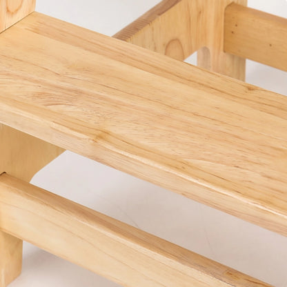 Close-up of the smooth step platform and natural wood grain on the solid rubberwood standing stool