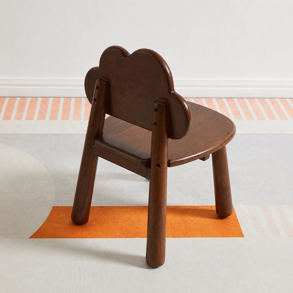 Rear view of the solid rubber wood toddler chair showing the cloud-shaped backrest structure