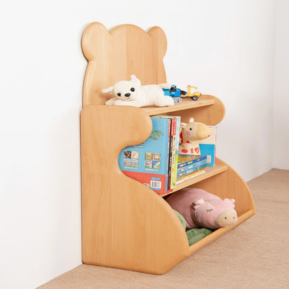 Side-angled view of a bear-shaped kids bookshelf showing the thick curved wood side panels against a white wall