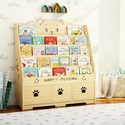 Front view of a bear theme solid pine Montessori toddler bookshelf with three paw-cutout drawers filled with books