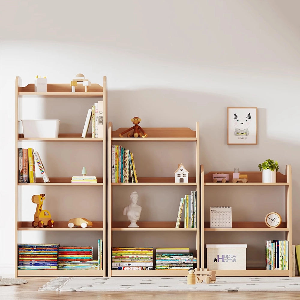 Front view of three pine-core engineered wood bookshelves in horizontal shelf mode holding toys and books