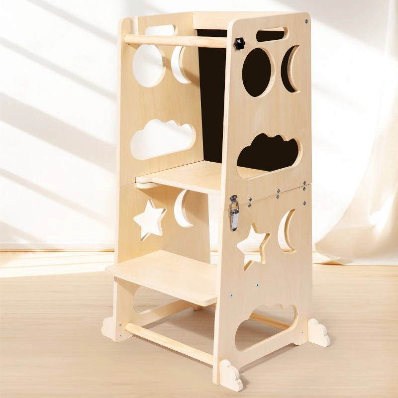 Three-quarter view of a convertible Montessori toddler step stool with star and moon cutouts