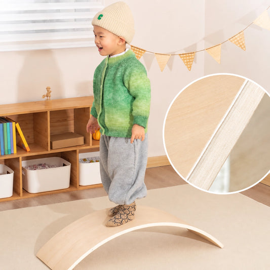 Child standing on a wooden balance board beside an inset close-up of multi-layer plywood edges