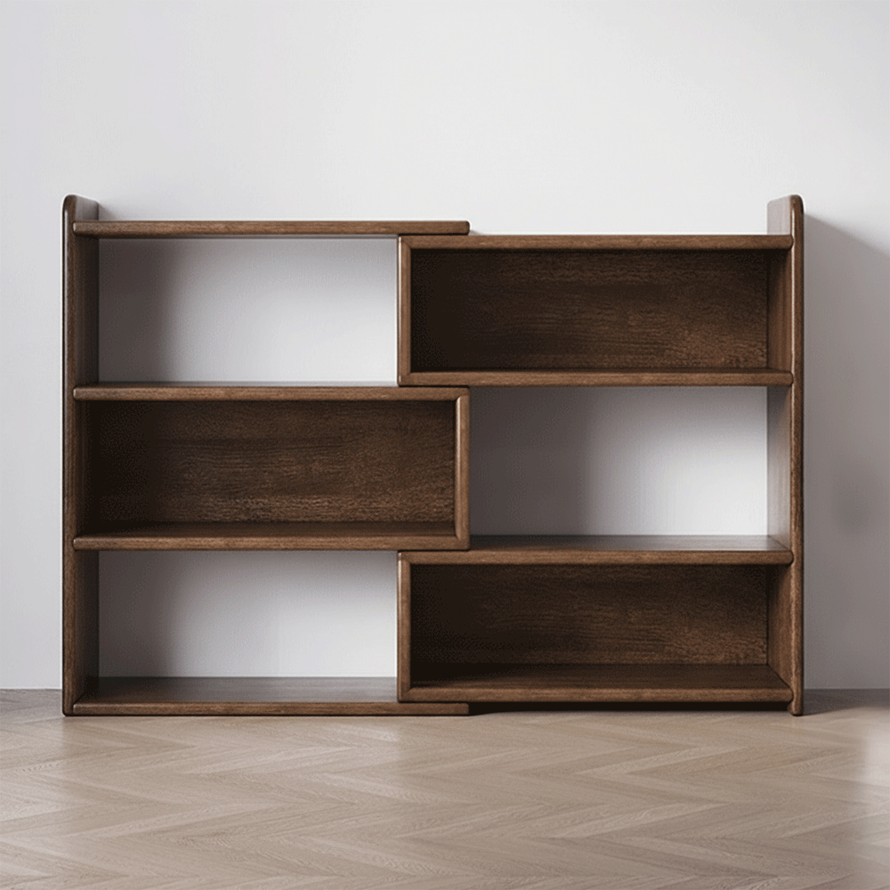 Front view of an empty solid rubberwood expandable floor bookshelf against a plain white wall
