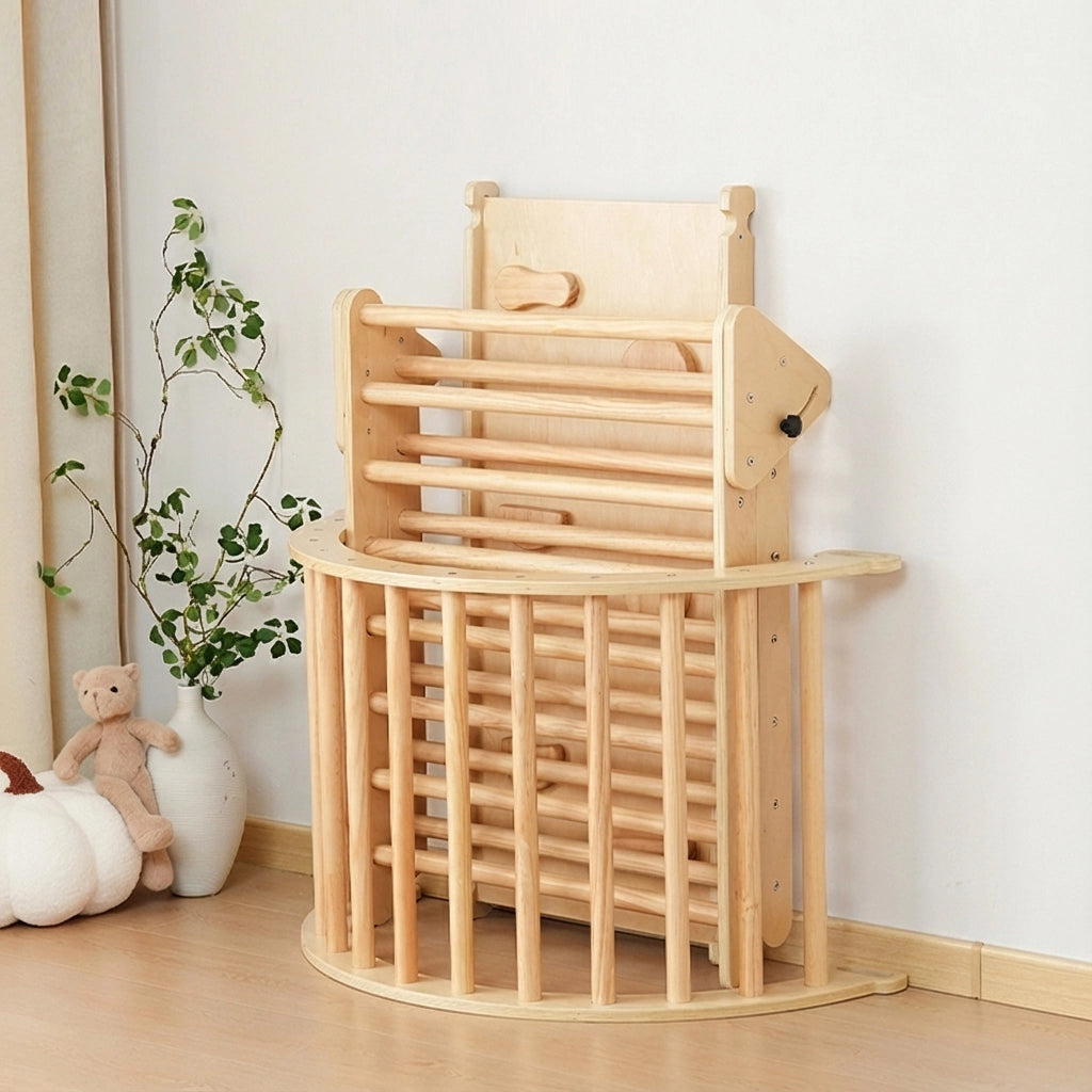 Folded plywood Montessori climbing set stacked compactly against a wall for easy storage