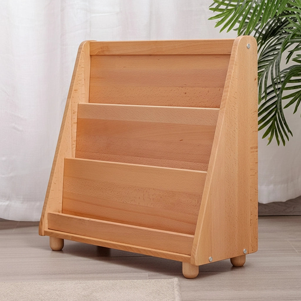 Right-angled view of an empty solid beech wood Montessori book rack with three storage tiers