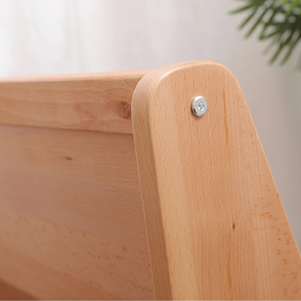 Close-up of a rounded corner joint and flush metal screw on the solid beech wood book rack