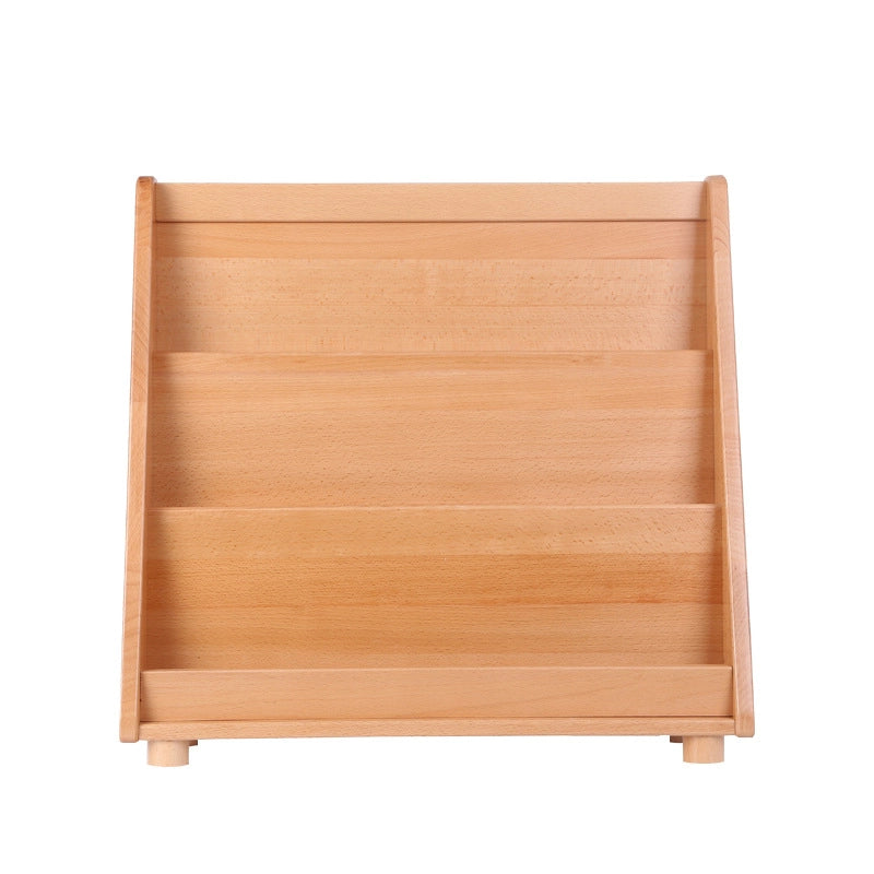 Front view of an empty solid beech wood Montessori book rack on a pure white background