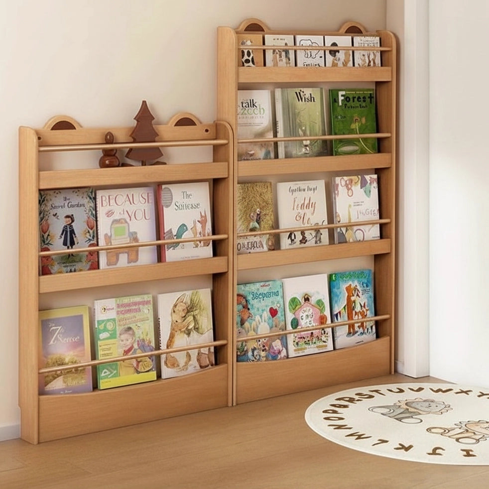 Two front-facing rubberwood bookshelves of different heights displaying children's books in a playroom