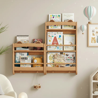 Front view of two solid rubberwood wall bookshelves mounted in a nursery with hot air balloon decor
