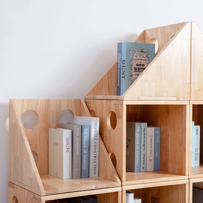 Close-up angled view of the solid rubberwood modular bookshelf showing circle cutouts on the side panels