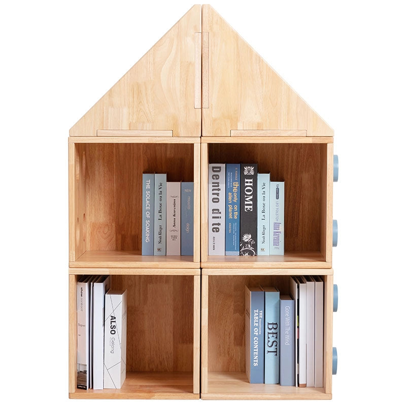Front view of a solid rubberwood house-shaped bookshelf filled with books across square and triangular cubbies