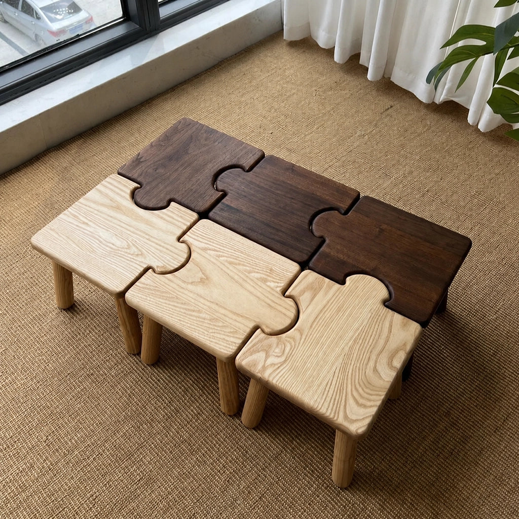 High-angle view of six solid wood puzzle stools interlocked together to form a larger rectangular bench