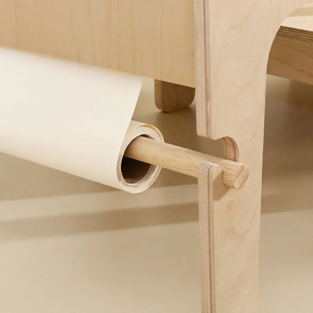 Close-up of the paper roll holder dowel mounted under the marine plywood activity table