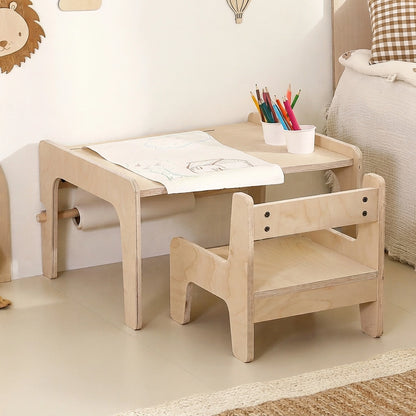 Three-quarter view of a marine plywood kids activity table and chair set with a paper roll