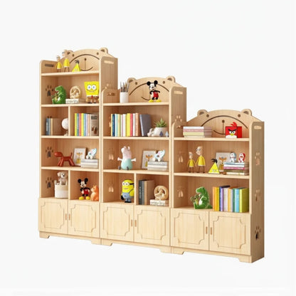 Three-piece stepped solid pine kids bookshelf and toy cabinet with doors on a white background