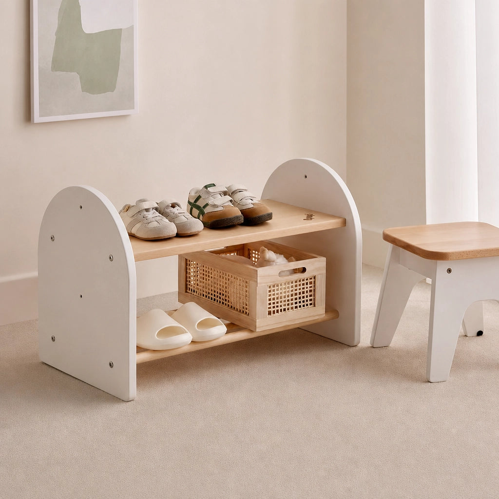 Low angled view of the solid beech wood shoe bench base holding children's shoes and a storage crate