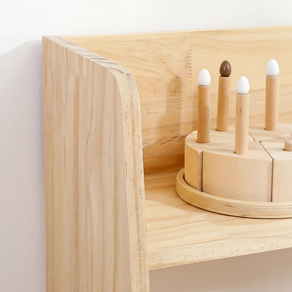 Detailed view of the smooth side panel corner and natural wood grain on the unfinished pine shelf