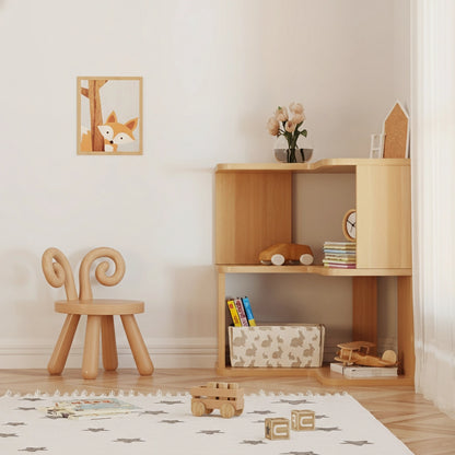 Left angled view of a low three-tier L-shaped corner bookshelf with books and a wooden car next to a kids chair