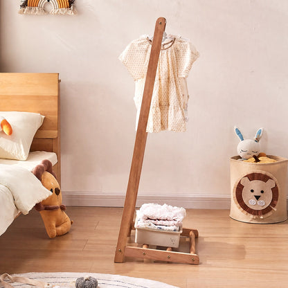 Side view of the L-shaped solid wood kids clothing rack showing its profile and lower storage shelf