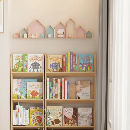 Straight-on view of two modular Montessori book racks filled with books under house-shaped wall shelves