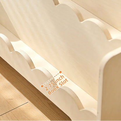 Close-up detail of a plywood shelf on the toddler bookshelf with an overlay measuring "2.75 inch Book Slot"