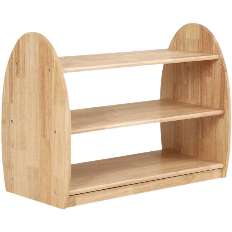 Three-quarter view of an empty solid rubberwood kids toy shelf with double arched side panels on a white background
