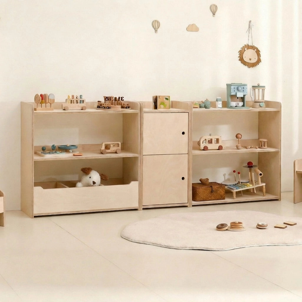 Three marine plywood Montessori modular toy organizer cabinets lined up together against a wall
