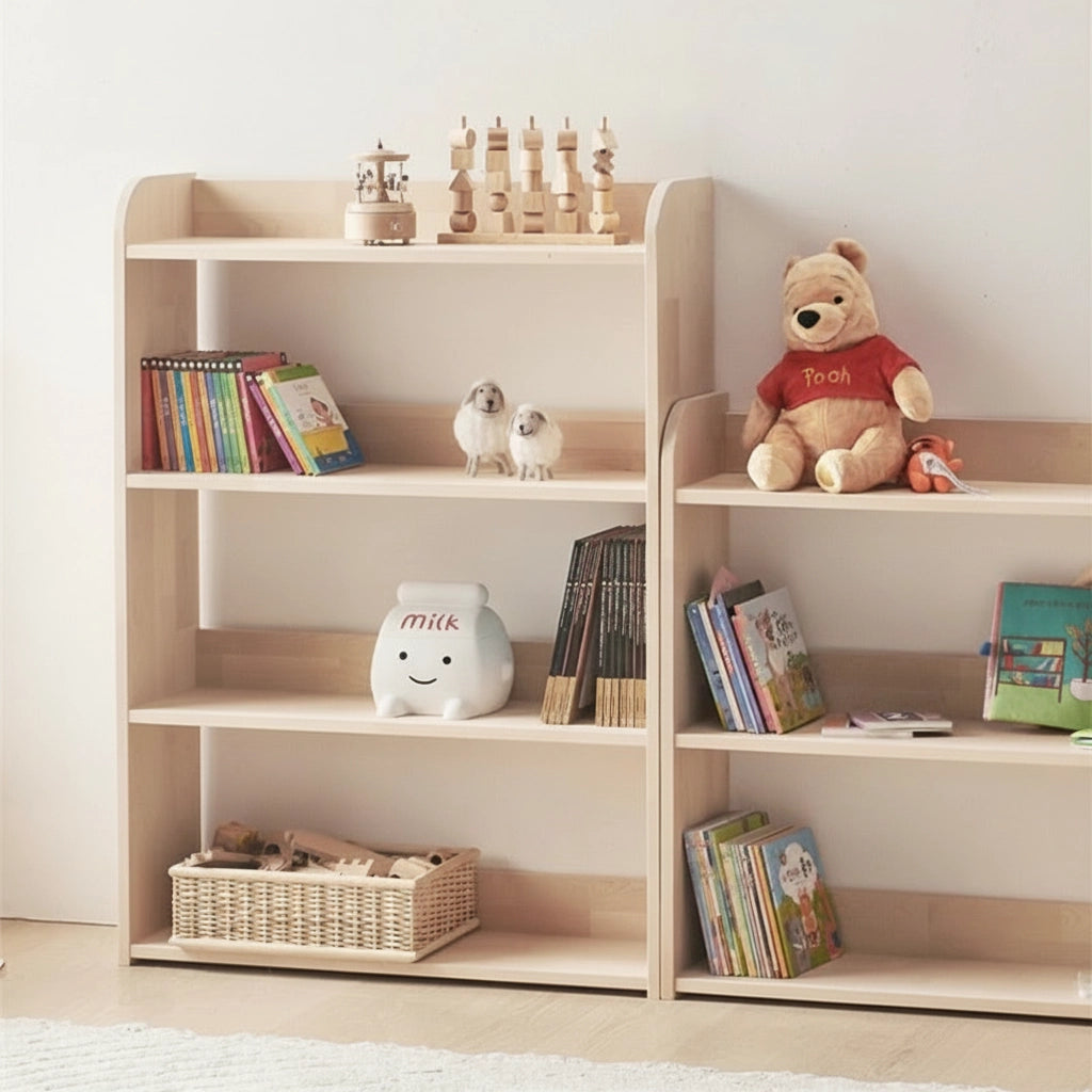 Angled view of two solid pine toddler toy shelves placed together, filled with children's books and toys