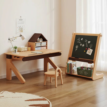 Playroom setting showing a solid beech study desk with a table lamp alongside the magnetic chalkboard easel