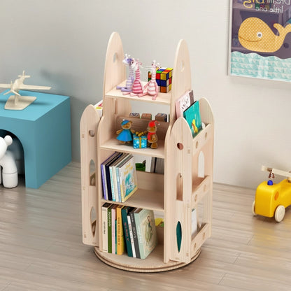 Close three-quarter view of a solid pine rocket bookshelf holding colorful picture books and toys