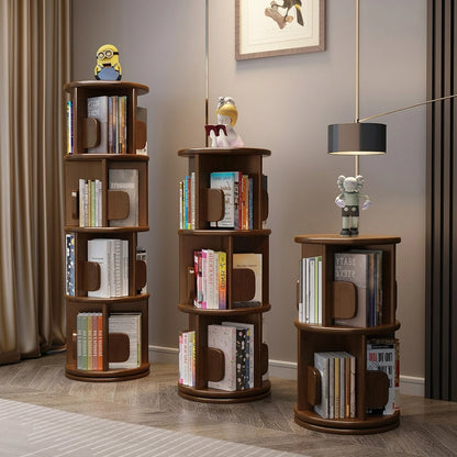 Three rotating solid wood kids bookshelves in a dark brown finish and varying heights displayed in a room