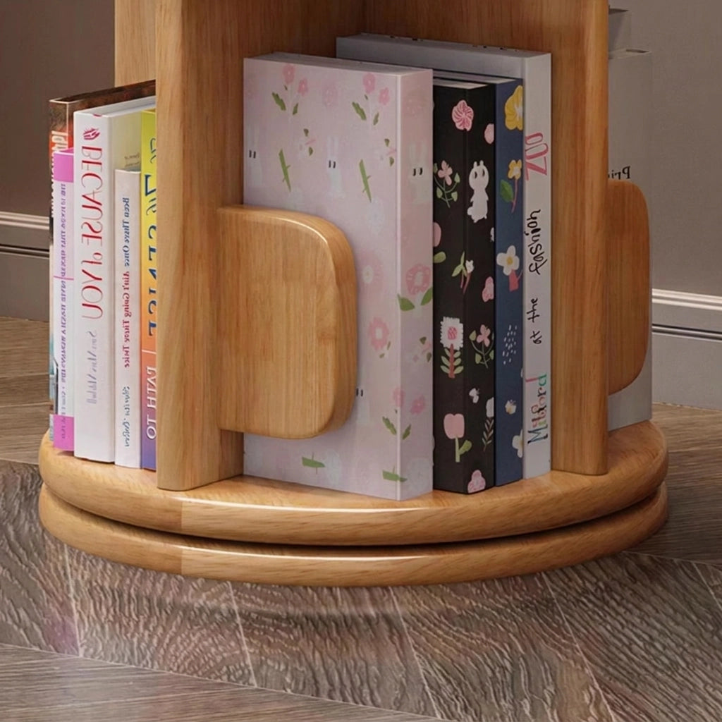 Close-up of the circular rotating swivel base structure of a natural solid wood kids bookshelf on the floor