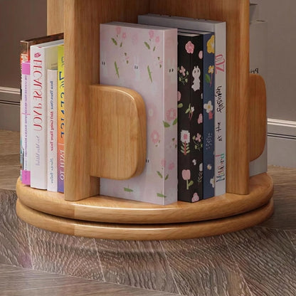 Close-up of the circular rotating swivel base structure of a natural solid wood kids bookshelf on the floor