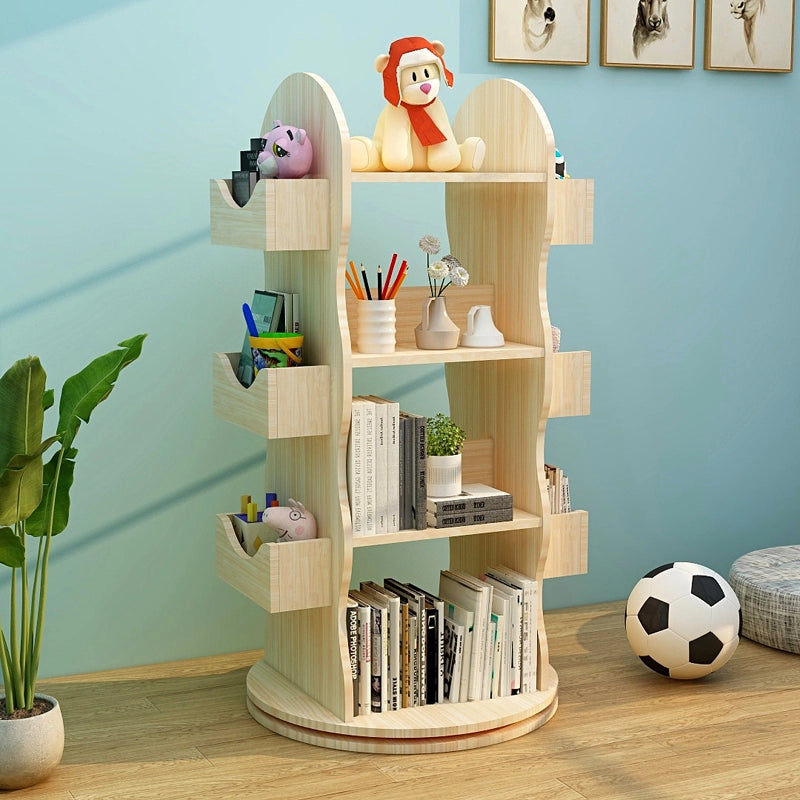 Three-quarter view of a rotating Montessori bookshelf styled with a plush bear toy on the top shelf
