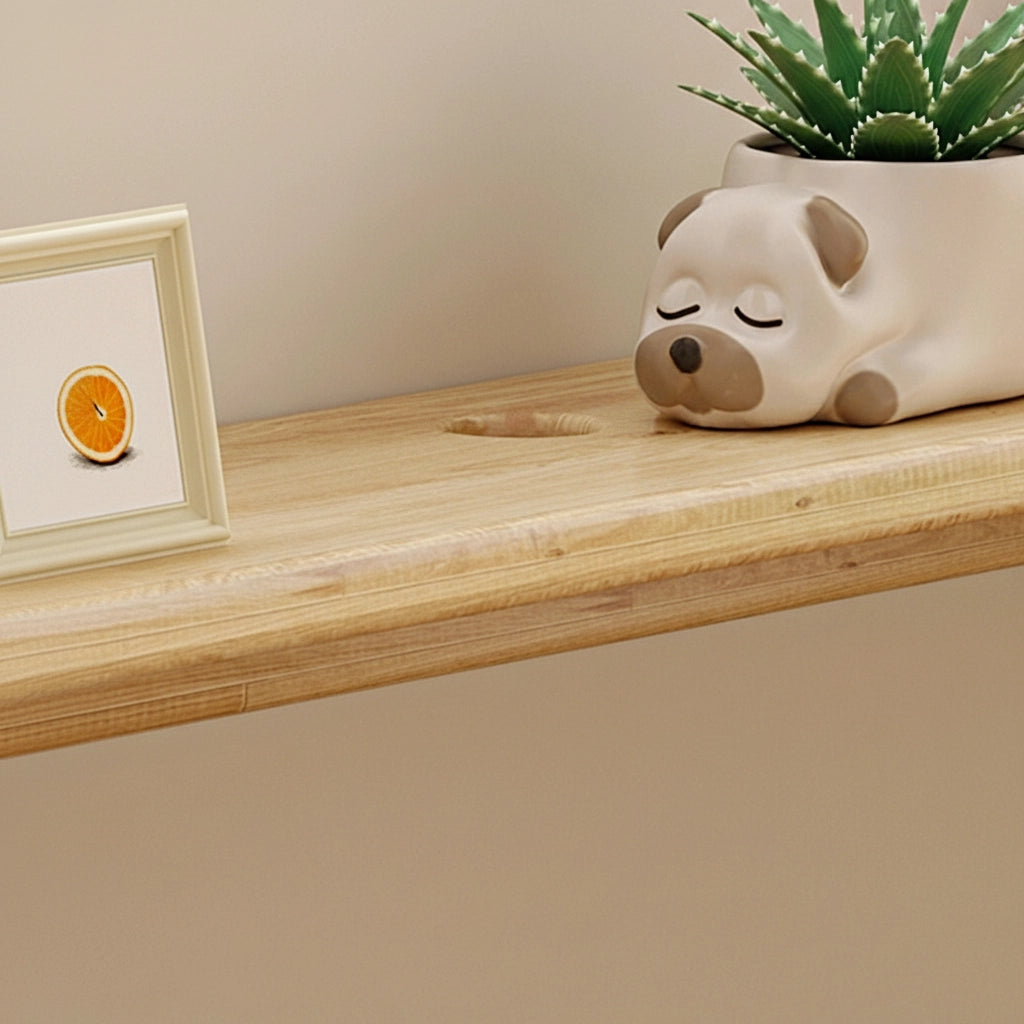 Close-up of the smooth top shelf surface showing a pre-drilled routing hole on the solid pine bookshelf