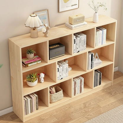 High-angle view of a three-tier solid pine staggered cubby bookshelf showing the top surface