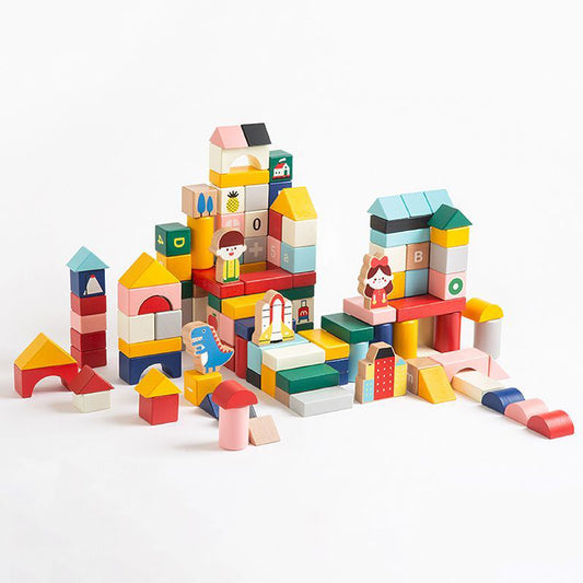 Large castle structure built with a colorful solid beech wood toddler building blocks set on a white background