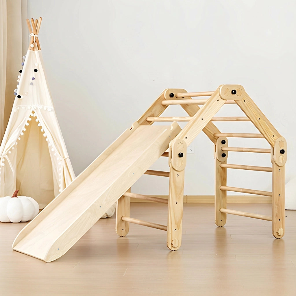 Empty pine and plywood Montessori climbing set configured in a house shape with an attached wooden slide