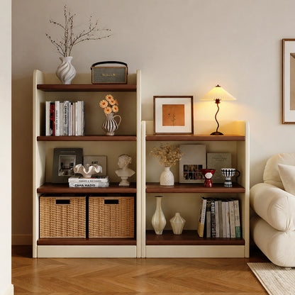 A tall and a short two-tone solid wood eco-board bookshelf combo placed next to a cream sofa